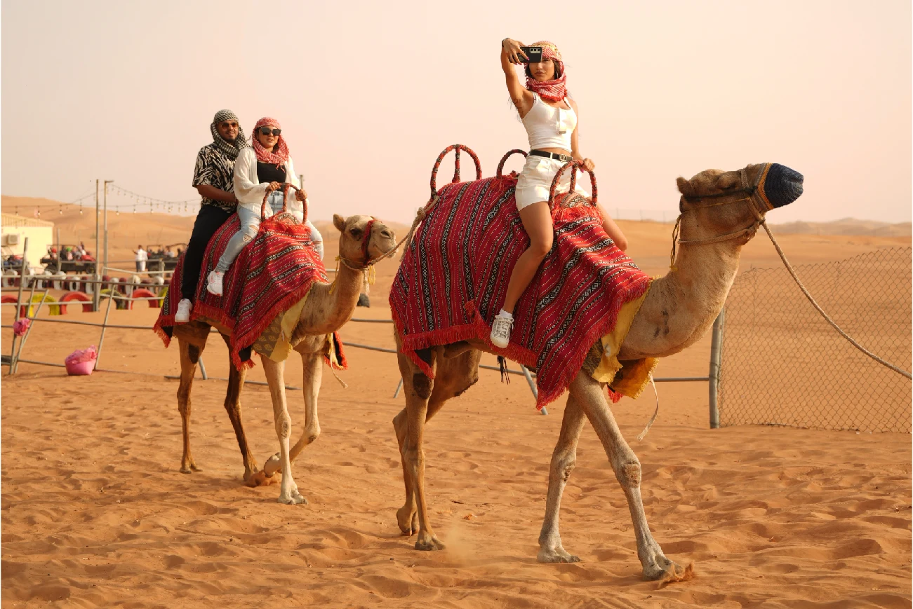 Camel ride in the desert